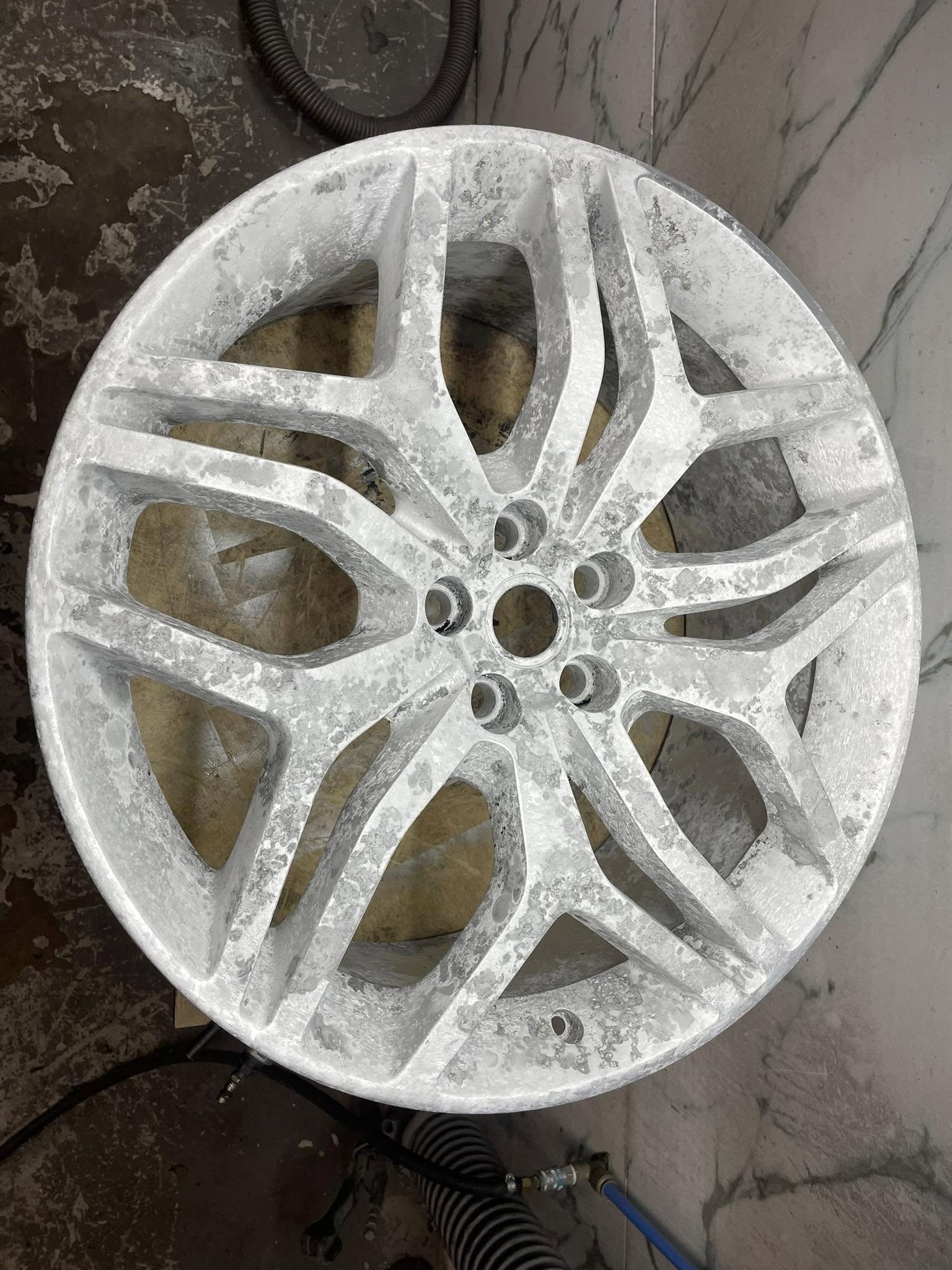EliteCarMasters alloy wheel refurbishment corroded wheels